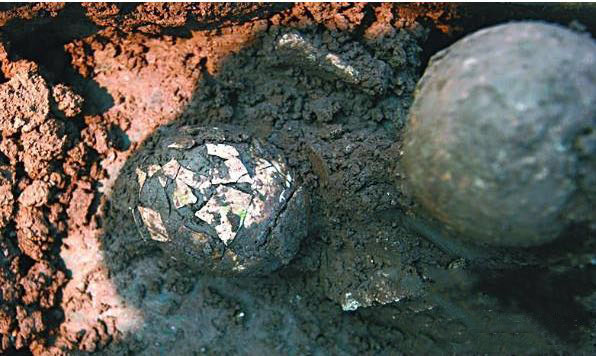 ��ͳ�Ļ�֮���ݳ�ˮ����һö�������� ���Ŷ�ͷ�������ȡ